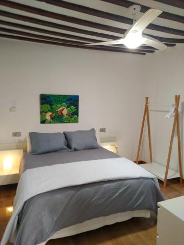 A bed or beds in a room at Patio de la Plata