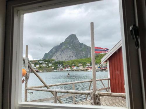 a view out of a window of a boat in the water at Reine Rorbuer - by Classic Norway Hotels in Reine