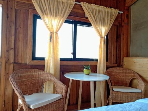 พื้นที่นั่งเล่นของ Matsu Seaside View Homestay