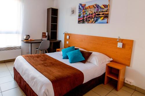 Letto o letti in una camera di Cerise Strasbourg