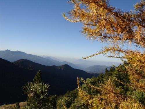 a view of the mountains from the top at Berghotel Jochgrimm - Your Dolomites Home in Varena