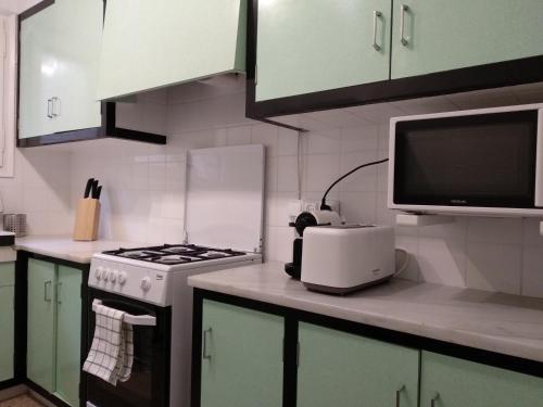 Η κουζίνα ή μικρή κουζίνα στο Apartamento 2 Cal Genís - WIFI