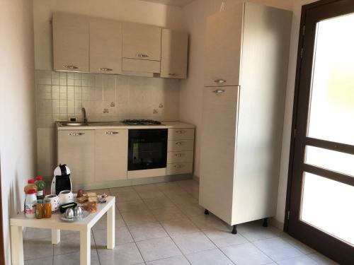 Kuchyň nebo kuchyňský kout v ubytování B&B Al Castello
