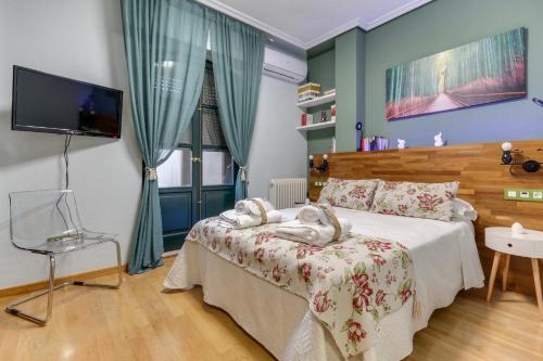 Säng eller sängar i ett rum på Central Quality Apartment Spa Salamanca