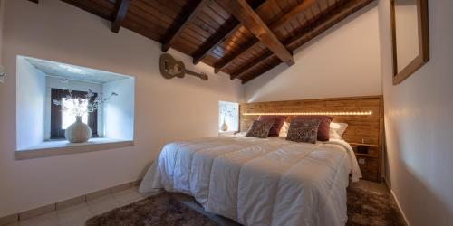 Кровать или кровати в номере Quinta dos Canteiros