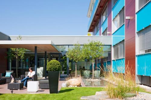 Zahrada ubytování Novotel Lausanne Bussigny
