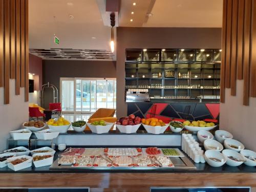 a buffet line with different types of food on display at Ramada by Wyndham Van in Van