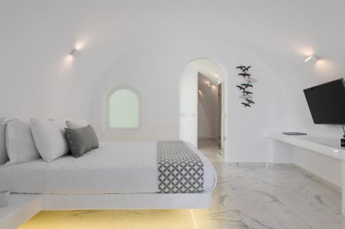 TV a/nebo společenská místnost v ubytování White Concept Caves