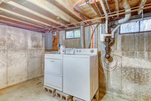 a laundry room with a washer and dryer at Kennebunk Family Cottage in Kennebunk