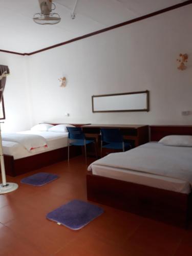 Katil atau katil-katil dalam bilik di Kongkeo Guesthouse