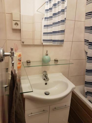 Ett badrum på Apartments Nikol - Ludwigshafen