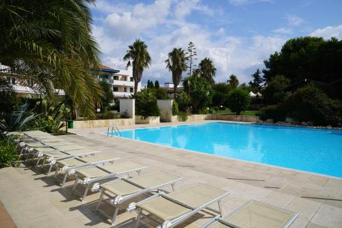 Πισίνα στο ή κοντά στο Villaggio Giardini D'Oriente