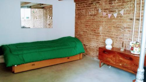 Una cama o camas en una habitación de Nice Apart en Caballito. Visitá Buenos Aires