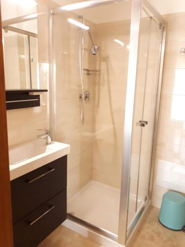 a bathroom with a shower and a sink at b&b aurora in Gravina di Catania