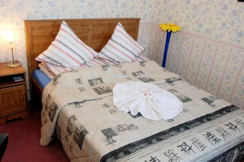 Cama o camas de una habitación en Guest House LT