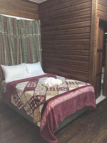Ένα ή περισσότερα κρεβάτια σε δωμάτιο στο Matus Guest House