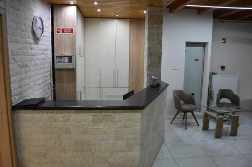 The lobby or reception area at Tisza Panzió és Apartman