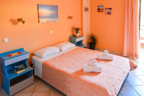 Letto o letti in una camera di Panos Apartments