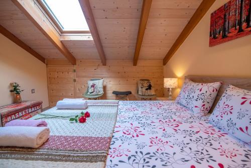 a bedroom with a large bed in a room at Soffitta Luminosa in Preveza