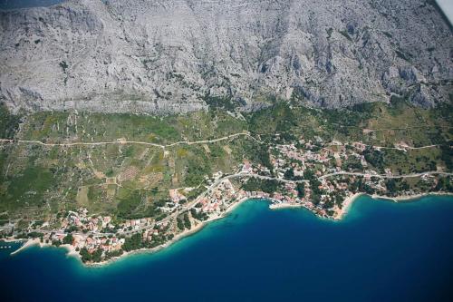 an aerial view of a city and the water at Apartments Mirko in Mimice