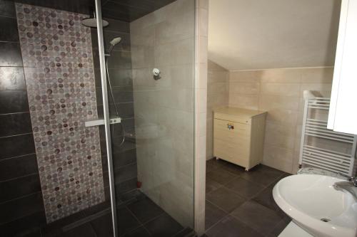 a bathroom with a shower and a sink at villa barisic in Drniš