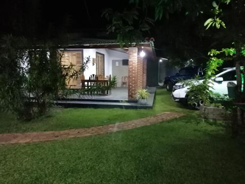 a house at night with cars parked in the yard at Green Cottage in Anuradhapura