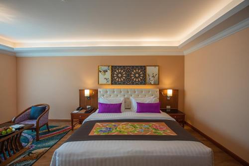 Letto o letti in una camera di The Empress Premier Chiang Mai