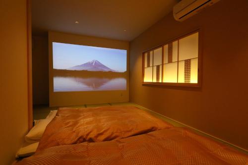 Cama o camas de una habitación en Tabist Wa Style Tokyo