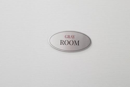 a button with the words crazy room written on it at casa ottaviano in Bologna
