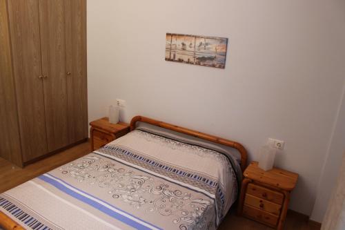 Giường trong phòng chung tại Comfortable apartment in the center of Athens