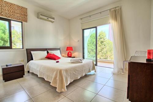 Postel nebo postele na pokoji v ubytování Villa Anatoli - Cape Greco