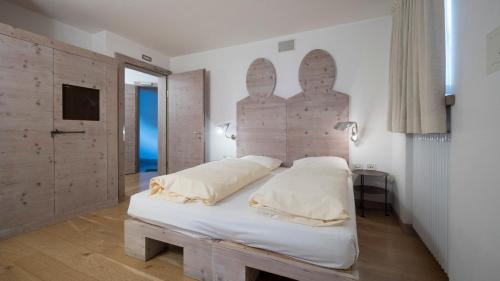 Ένα ή περισσότερα κρεβάτια σε δωμάτιο στο Chalet C'Est La Vie