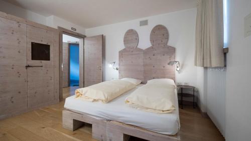 Postel nebo postele na pokoji v ubytování Chalet C'Est La Vie
