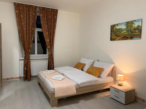 Cama o camas de una habitación en KK Apartments
