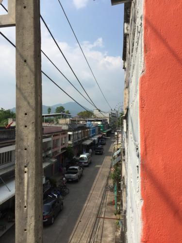 a view of a street from a building at SMILE HOME GUESTHOUSE in Rayong