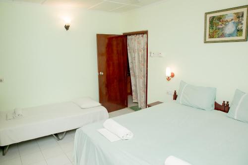Una cama o camas en una habitación de Villa Shade