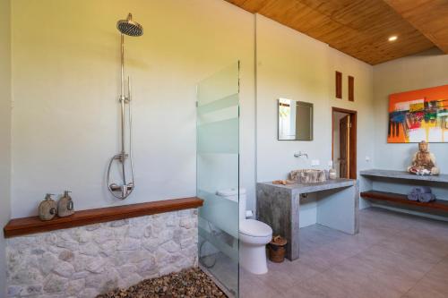Ванная комната в Manduna Resort