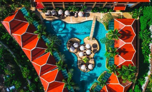 an aerial view of a resort with a swimming pool at Aonang Orchid Resort in Ao Nang Beach