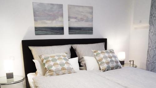 Ένα ή περισσότερα κρεβάτια σε δωμάτιο στο Boland Apartments