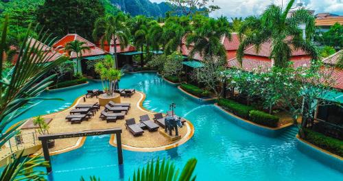 an aerial view of a pool at a resort at Aonang Orchid Resort - SHA Extra Plus in Ao Nang Beach