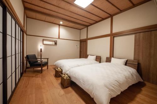 Säng eller sängar i ett rum på Kimachi-tei（きまち亭）