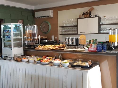 a buffet line with many different types of food at Bed & Breakfast Marta & Tona in Novalja