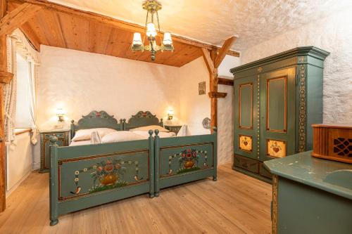 Ένα ή περισσότερα κρεβάτια σε δωμάτιο στο Ferienchalet Katharina