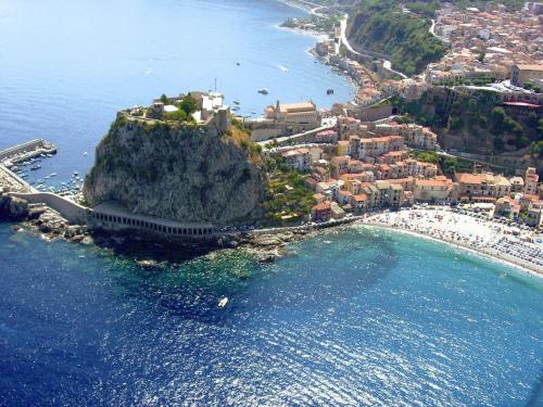 an aerial view of a small island in the ocean at Villa La Fenice in Reggio Calabria