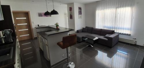 พื้นที่นั่งเล่นของ Ferienwohnung Apartment am Donau Radweg