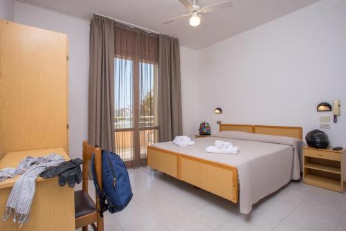 Cama o camas de una habitación en Hotel Maioli