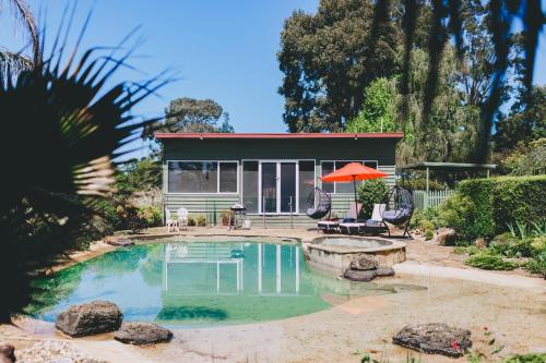 a house with a swimming pool in the yard at Dalblair Bed & Breakfast in Seville