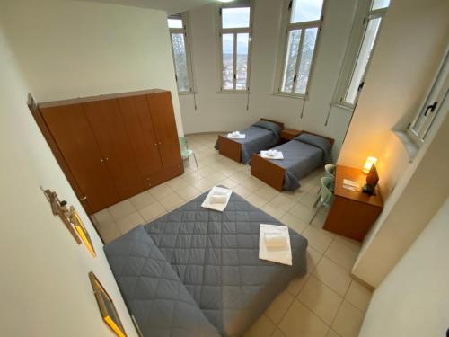 Un pat sau paturi într-o cameră la Casa per Ferie Sant'Anna