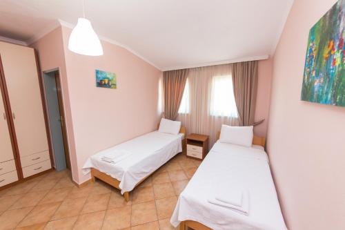 Postel nebo postele na pokoji v ubytování Hotel Heritage