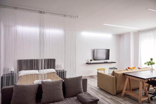 A television and/or entertainment centre at Loft Beta